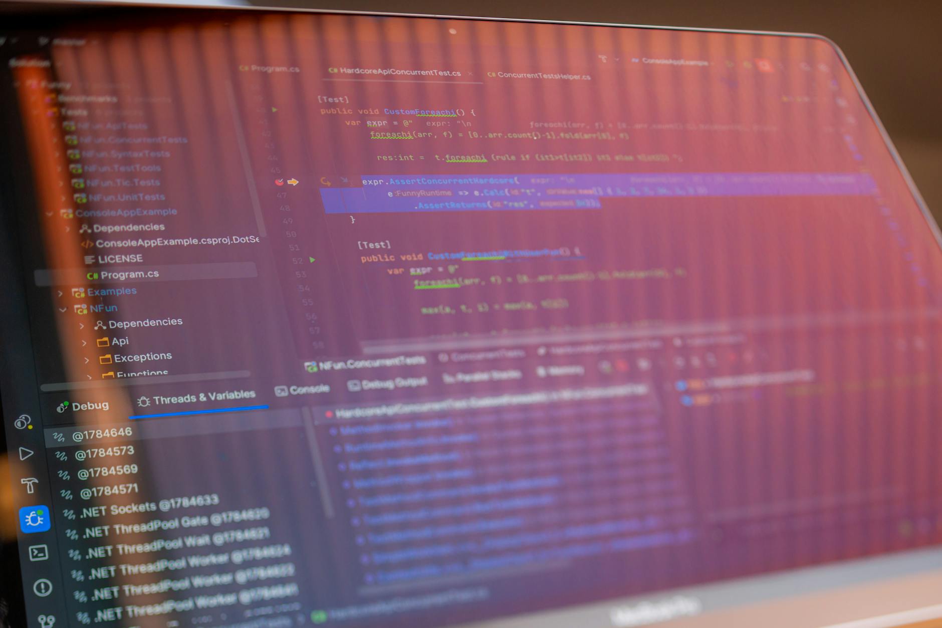 Computer screen displaying Reddit interface with multiple discussion threads and comments visible