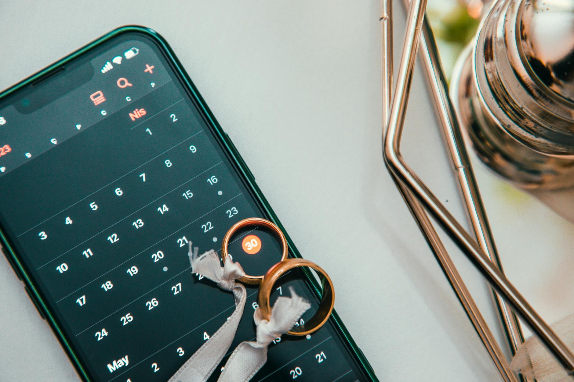 Person using smartphone with dating app interface visible on screen