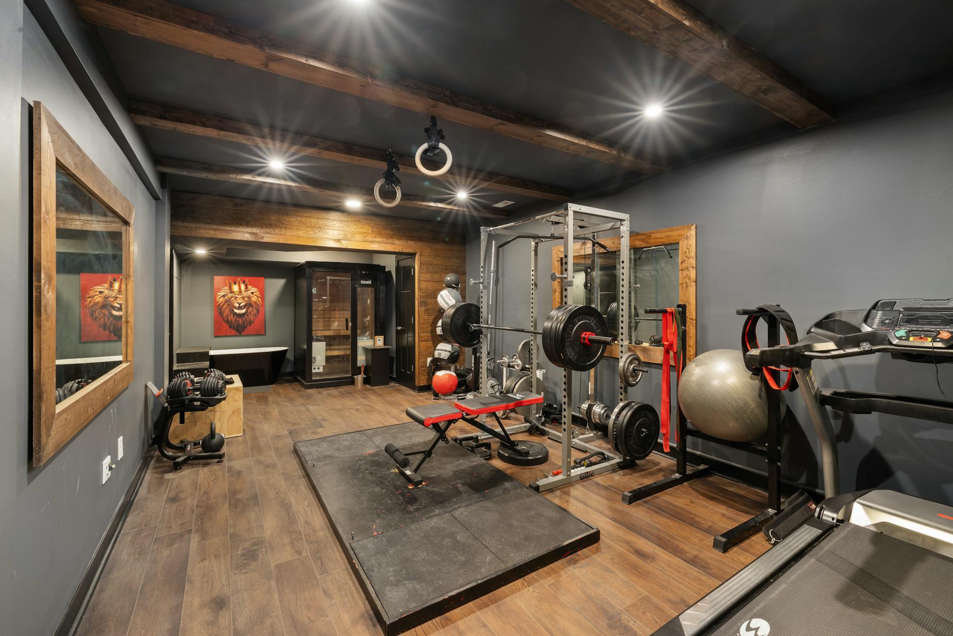 Modern luxury gym interior with exercise equipment and ambient lighting