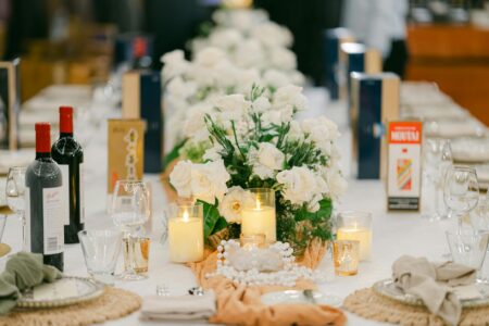 Why Wealthy Millennials Are Hiring Professional Party Planners for Casual Dinners Professionally styled dinner table with elegant place settings and ambient lighting