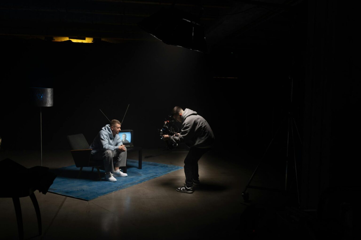 Bright television studio with professional lighting setup and cameras for game show production