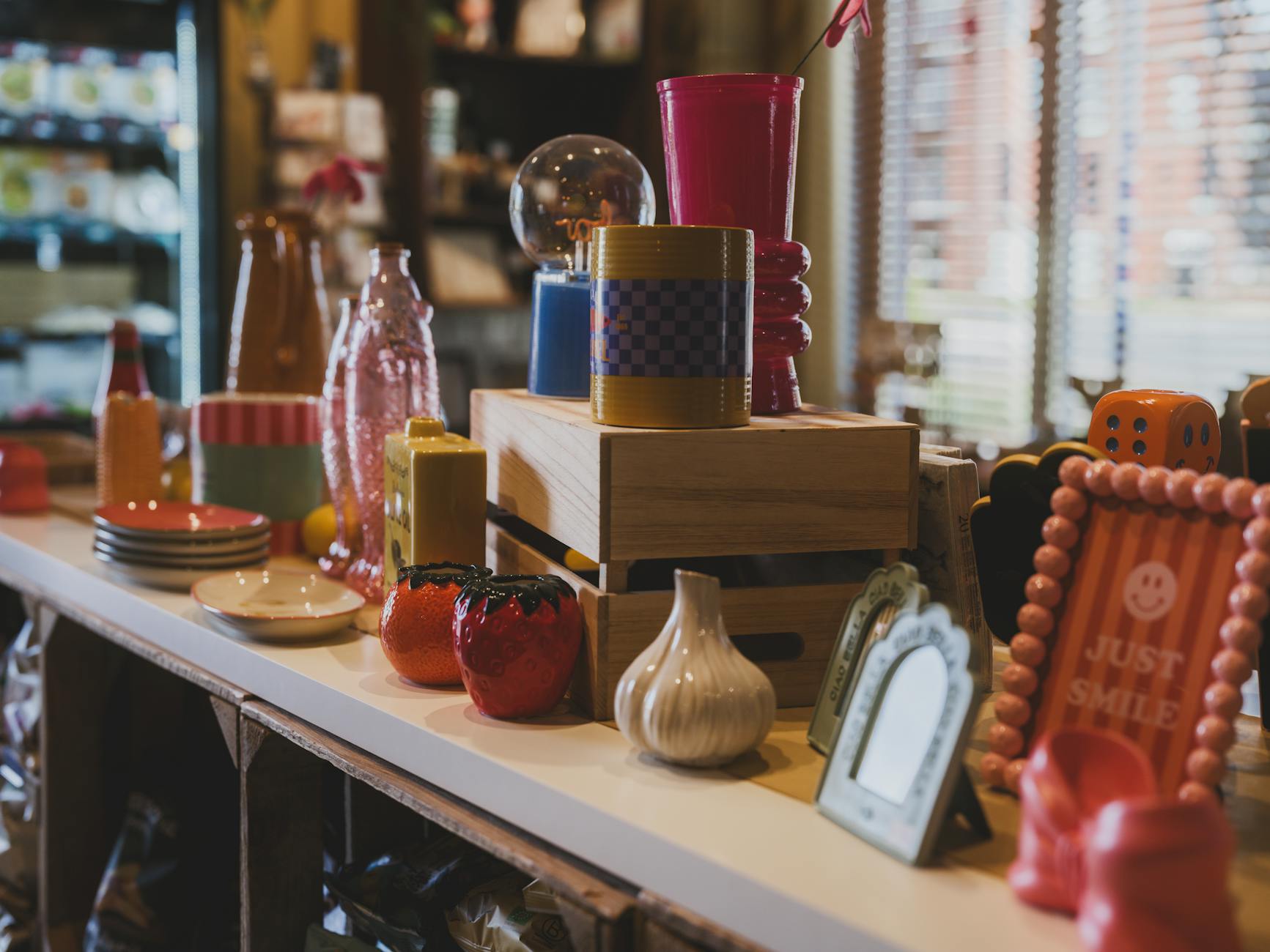Bright retail store interior with shelves displaying various merchandise and products