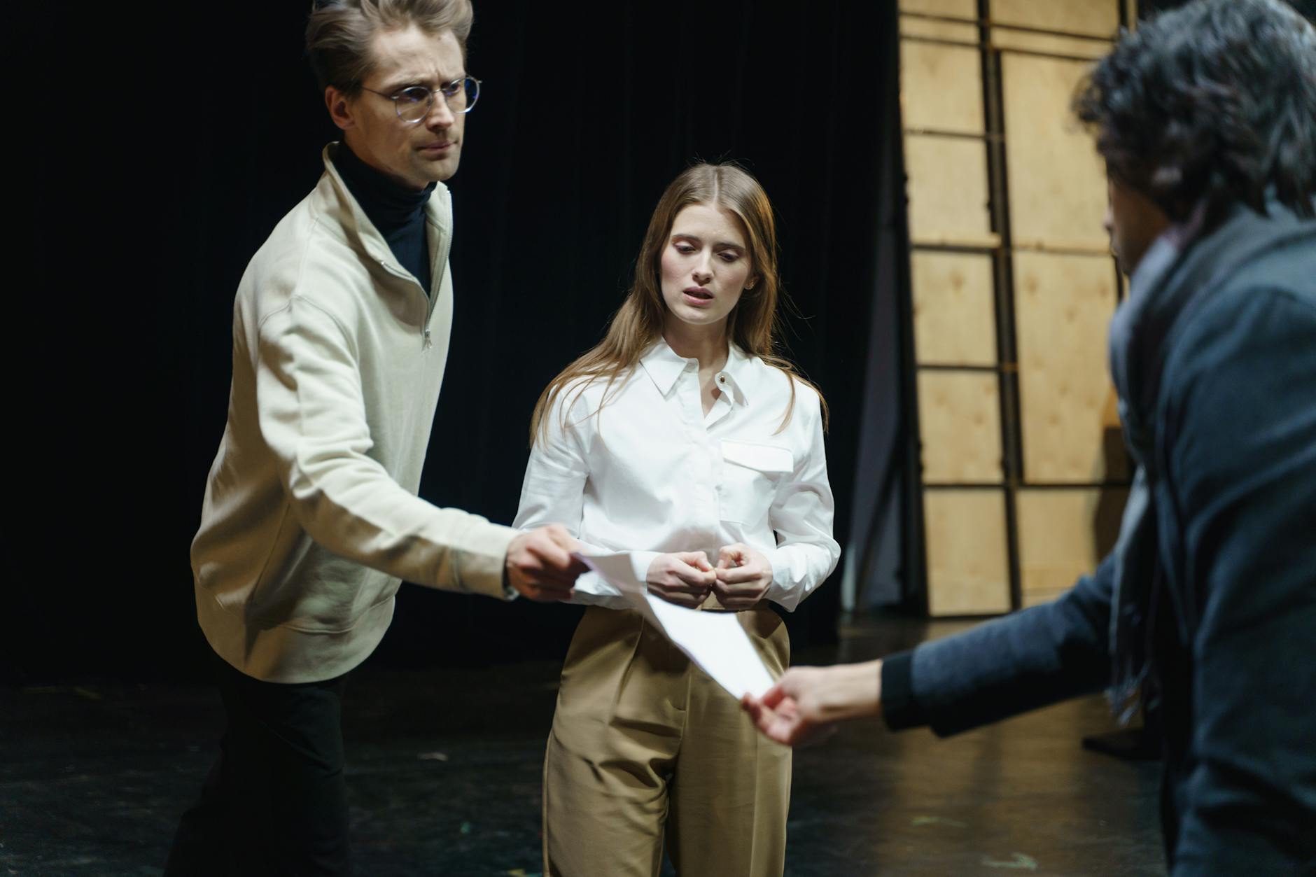 Professional headshot of person in entertainment industry setting