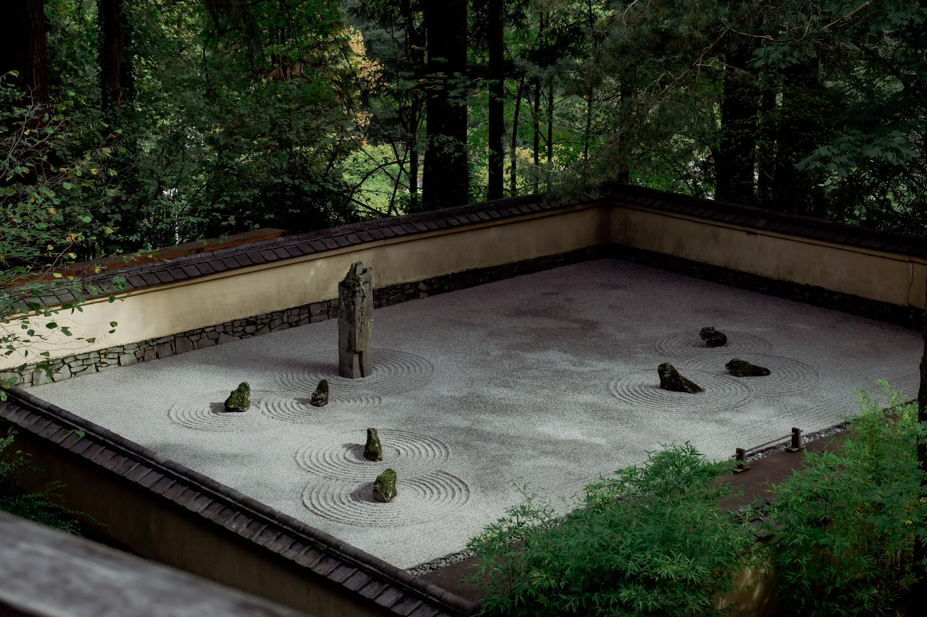 Serene meditation space with natural materials and negative space reflecting Japanese aesthetic principles