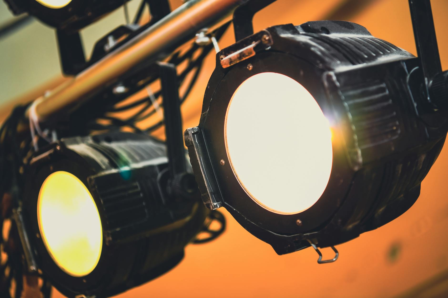 Broadway theater stage illuminated by dramatic spotlights and stage lighting