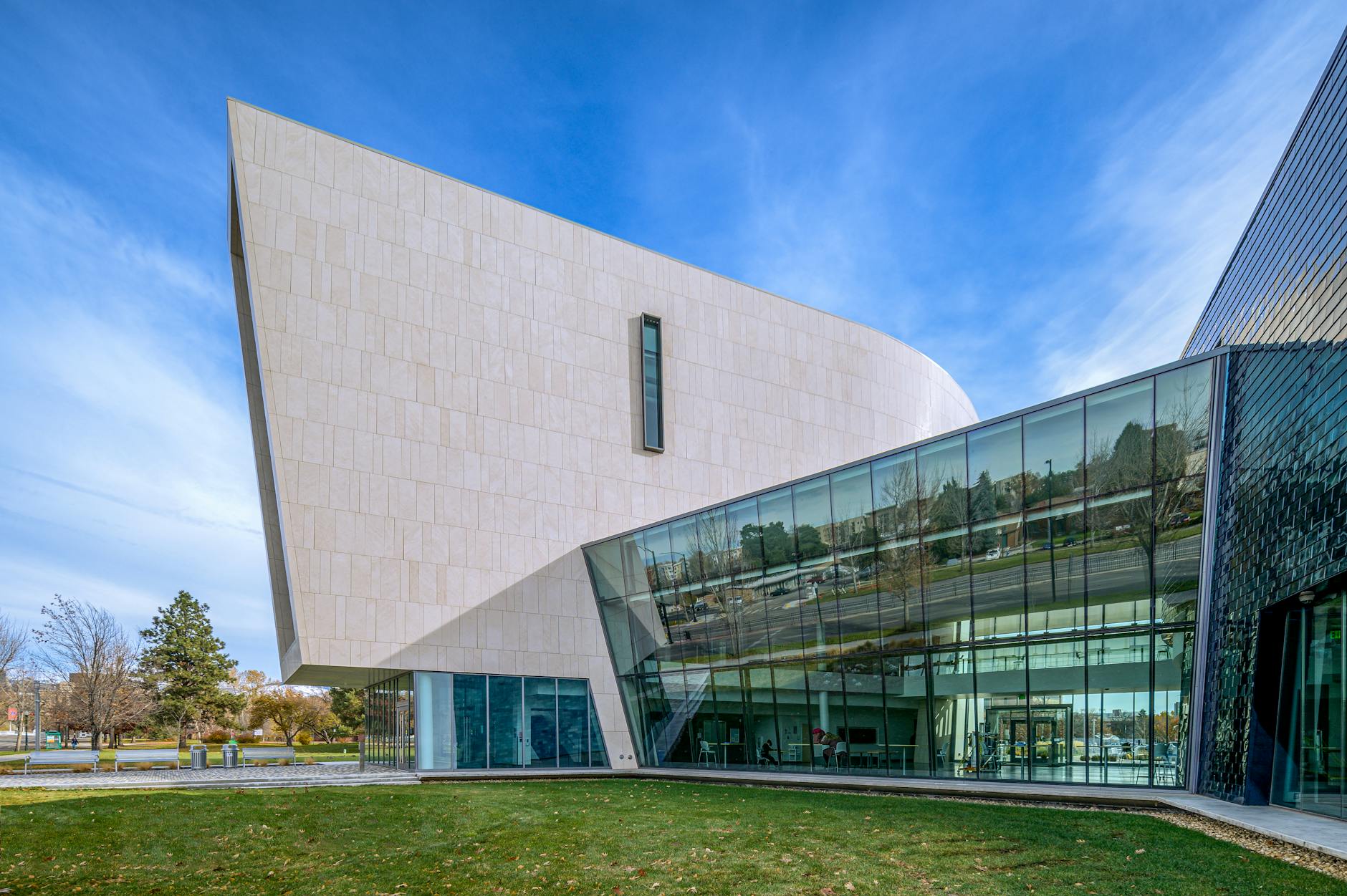 Interior of community center meeting room with people gathering