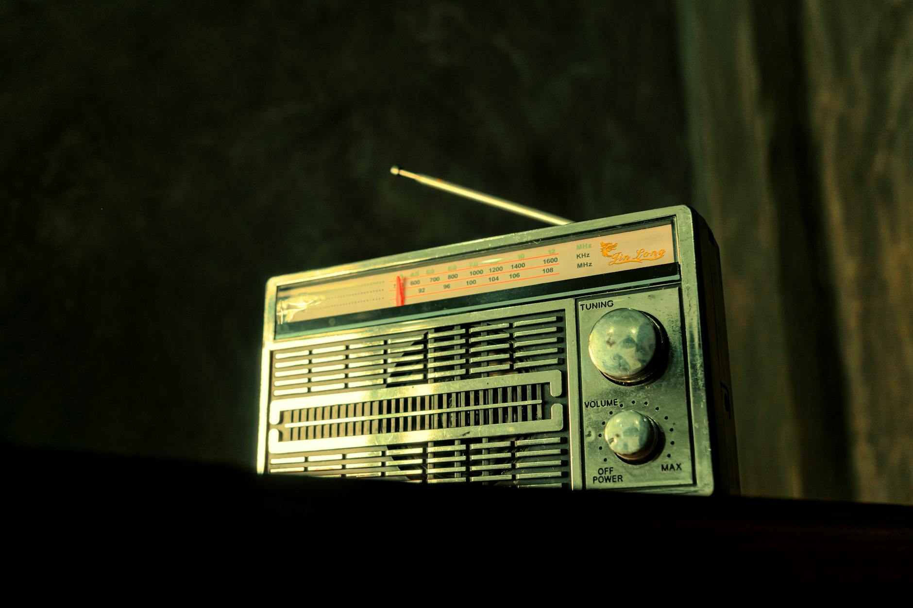 Traditional radio broadcasting studio with microphone and mixing equipment