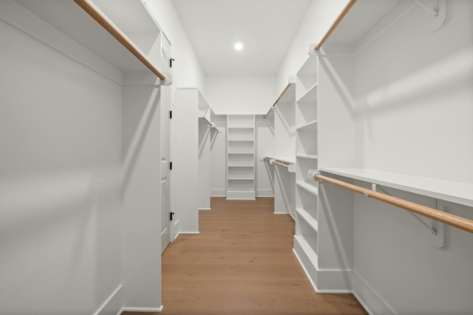 Well-organized closet interior showing storage solutions and clean design elements