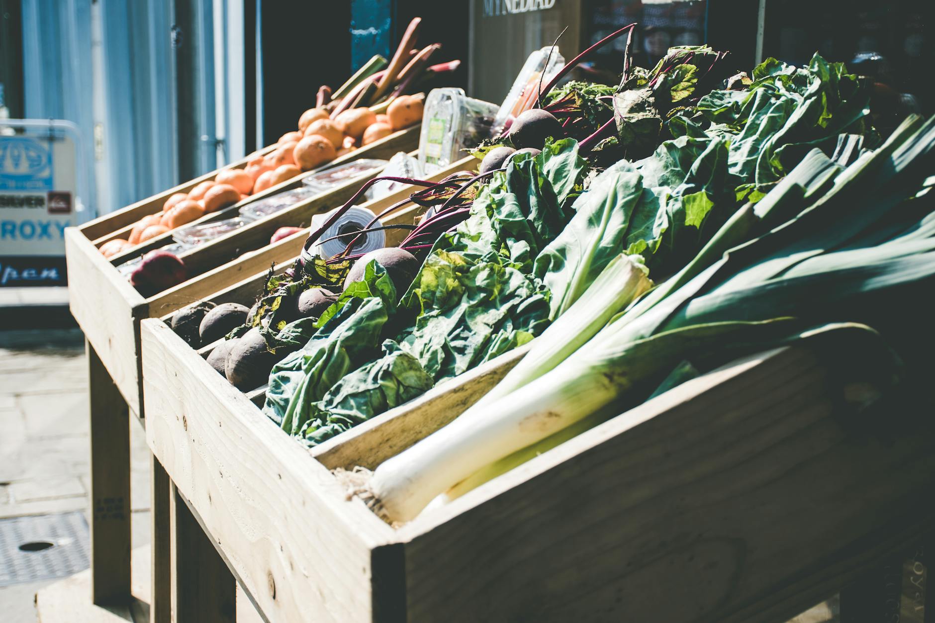 Colorful display of fresh organic fruits and vegetables at a farmers market