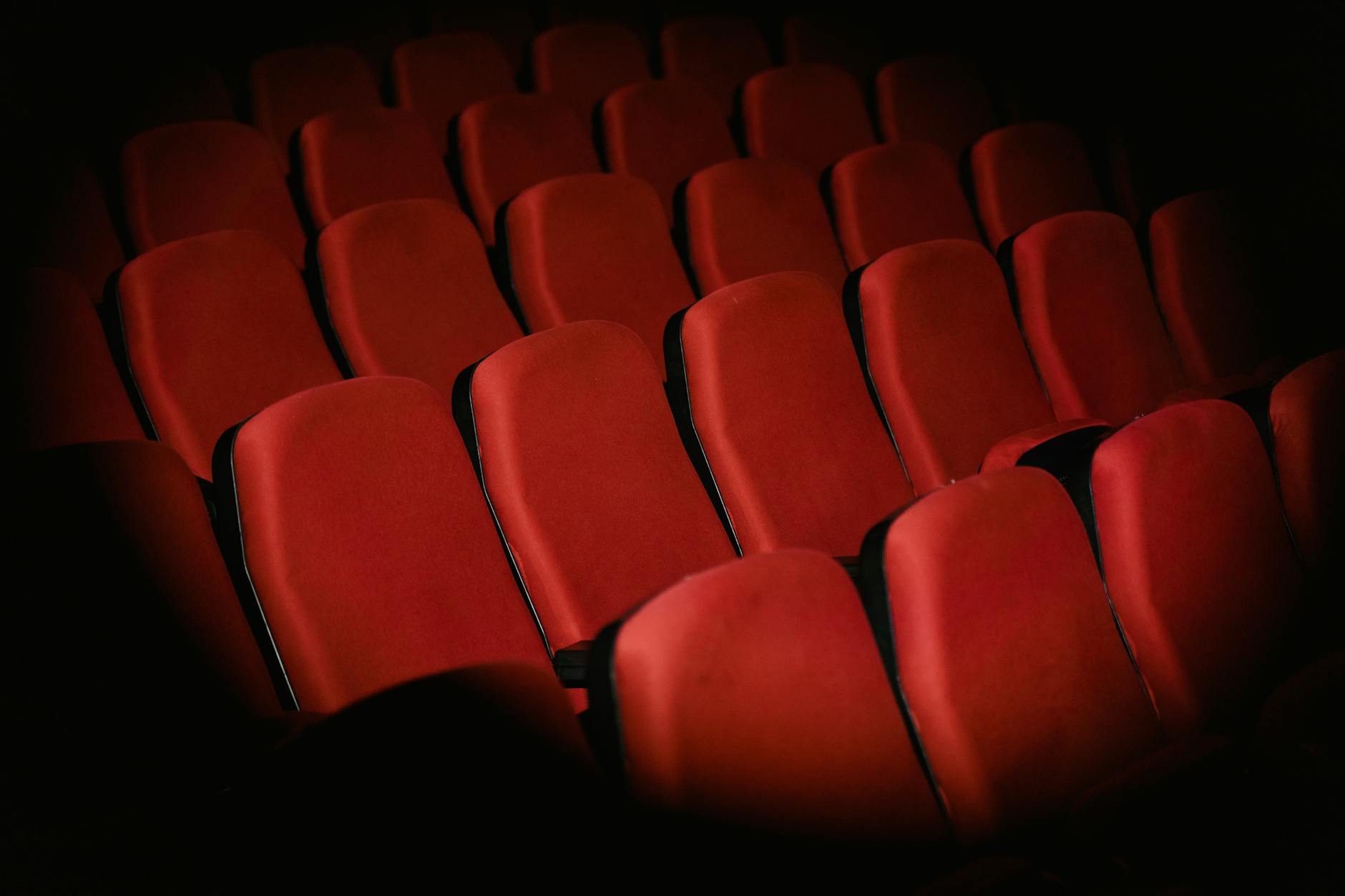 Movie theater audience watching a film, representing the end result of Reddit-inspired content development