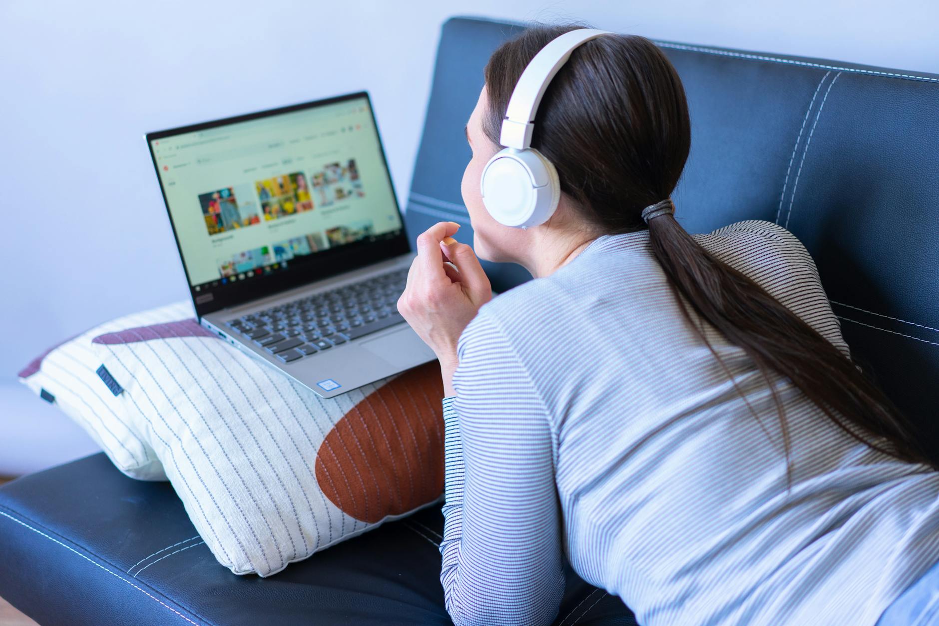 Person speaking into professional microphone while streaming content