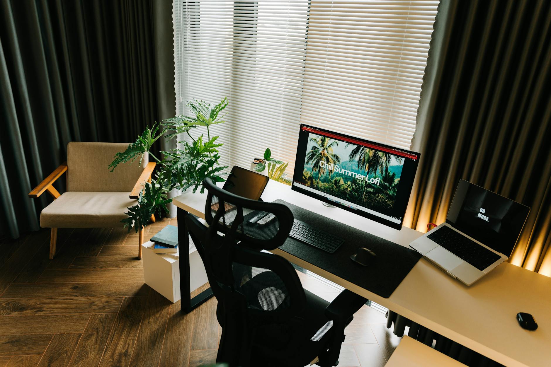 Modern home office setup with computer and organized workspace