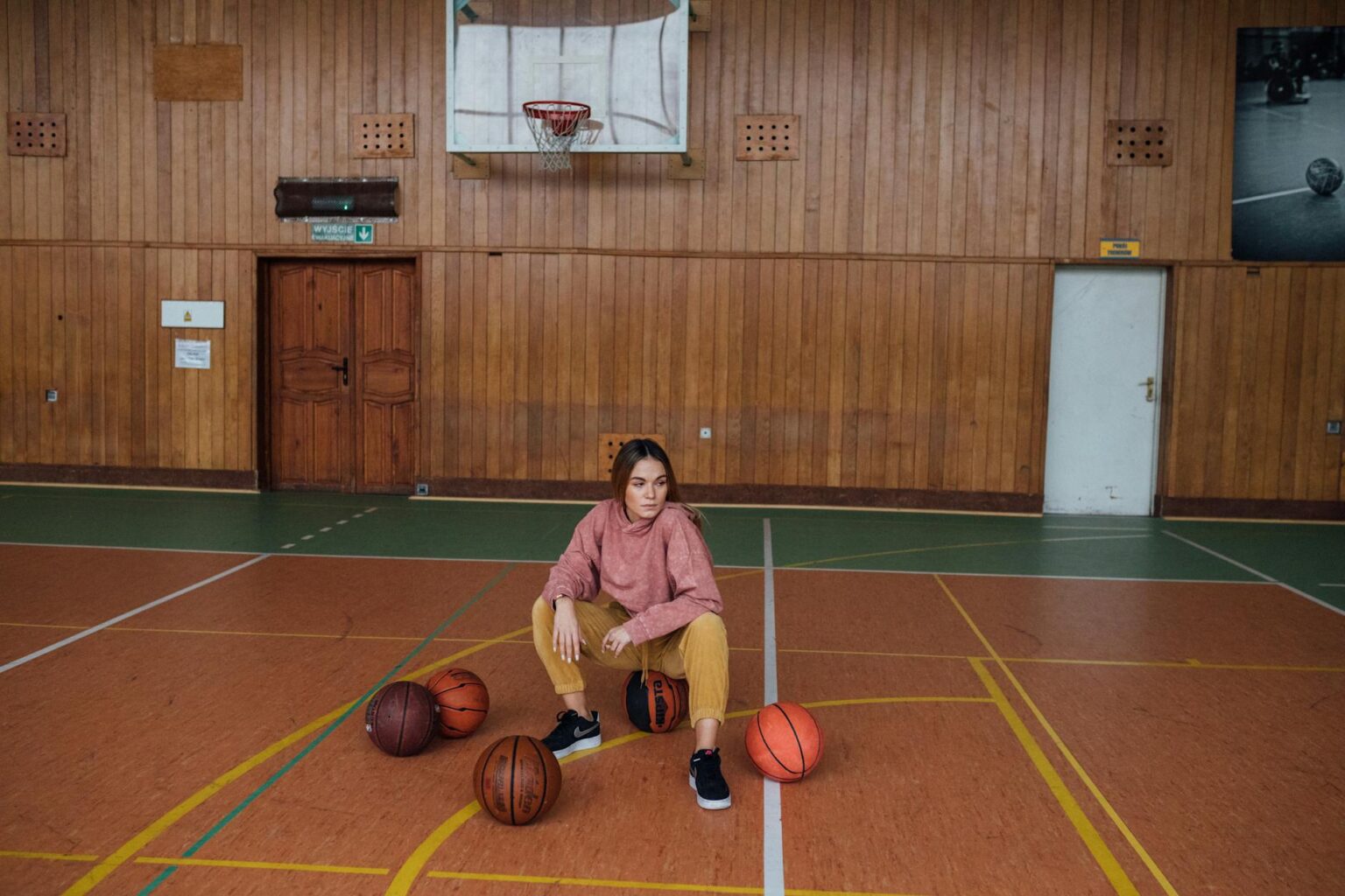 WNBA Player Launches Makeup Line Amid Court Beauty Backlash Female basketball player on court during game