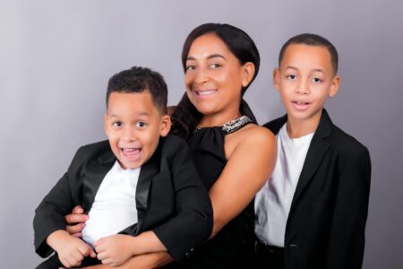 Family photo showing parents with children in elegant setting