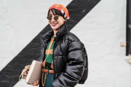 7 Lightweight Jackets Perfect for Layering in Warmer Weather Person wearing lightweight jacket in spring weather