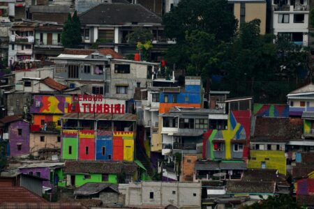 Urban neighborhood street showing residential buildings and community environment
