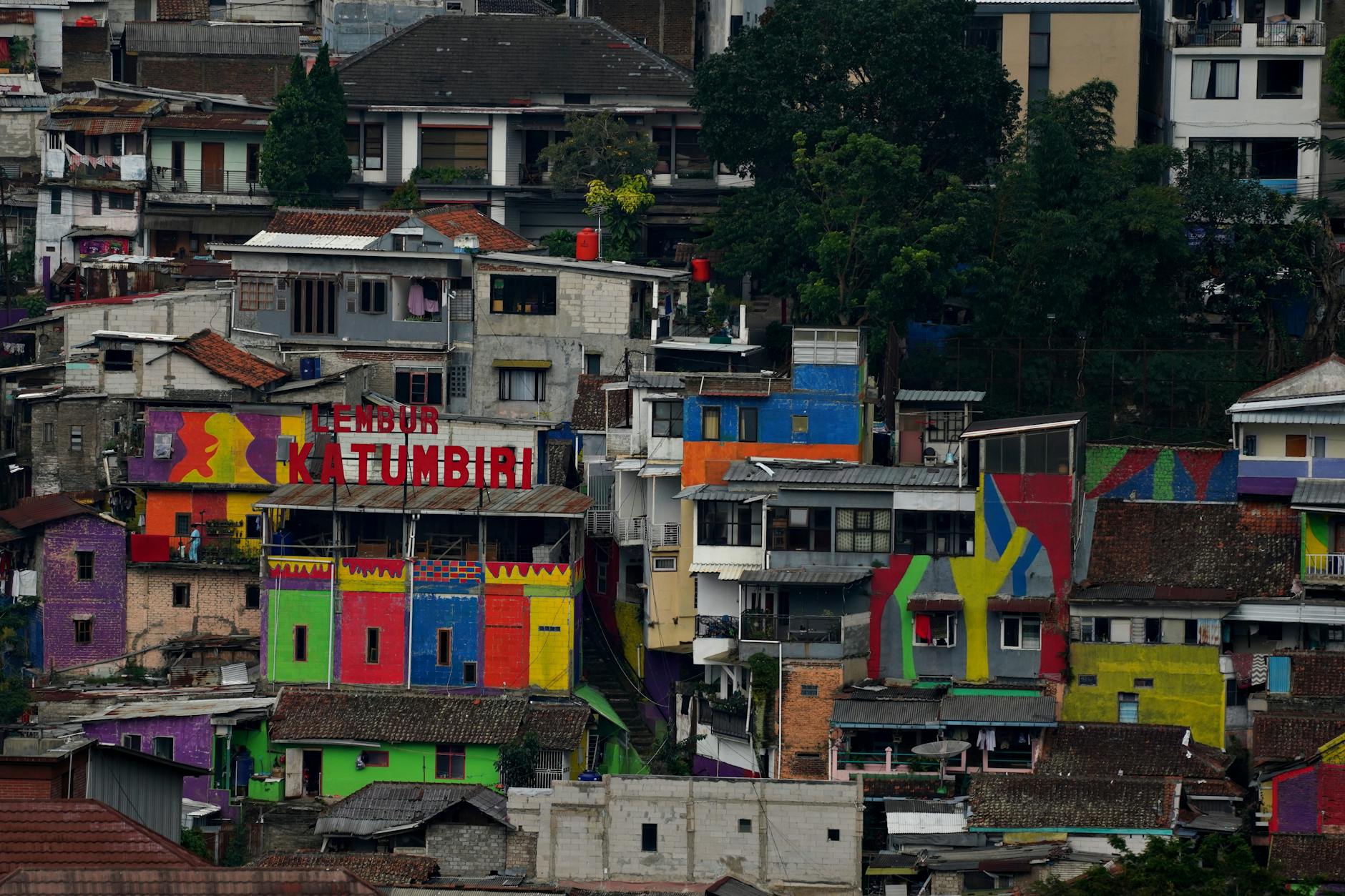 Urban neighborhood street showing residential buildings and community environment