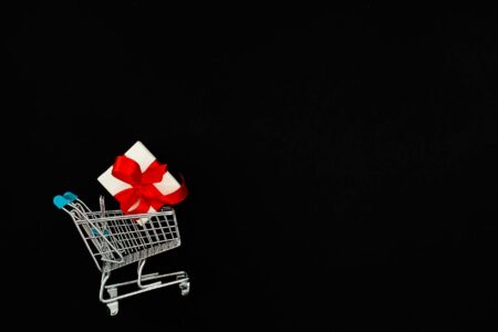 The Most Impressive Mother’s Day Gifts Under $200 Person browsing luxury items in upscale retail store