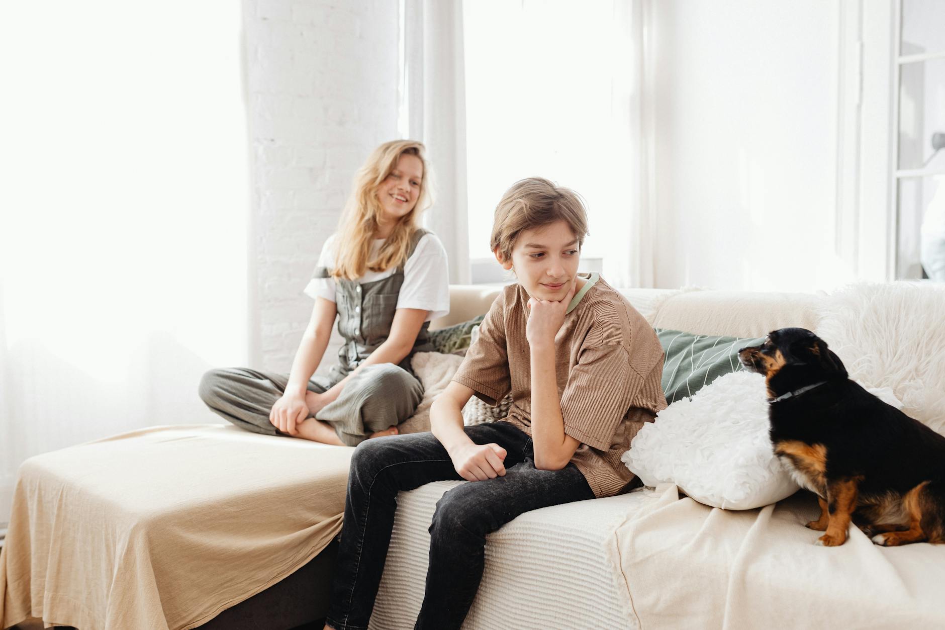 Two teenage girls walking together outdoors