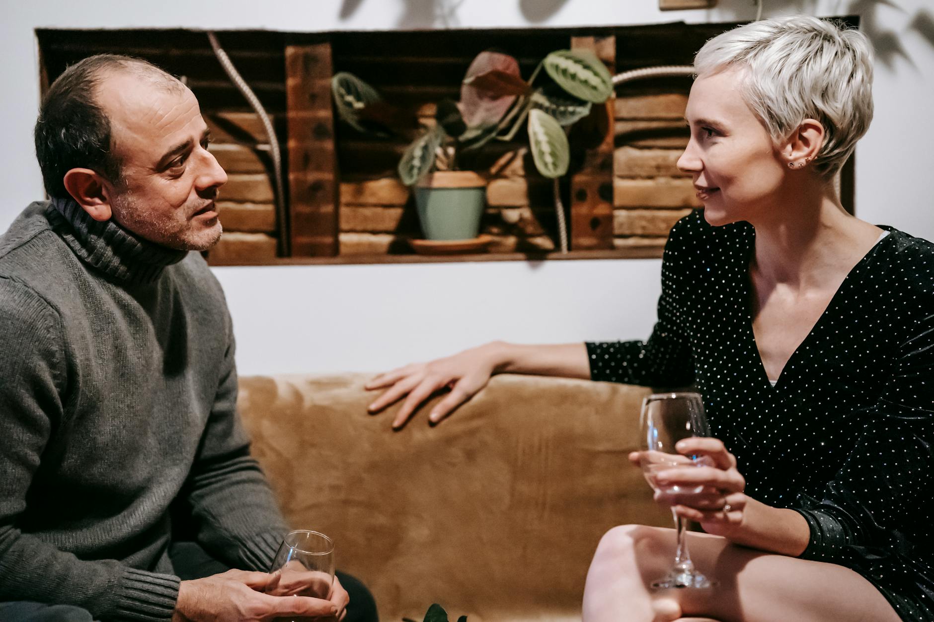 Two people engaged in intimate conversation showing emotional connection