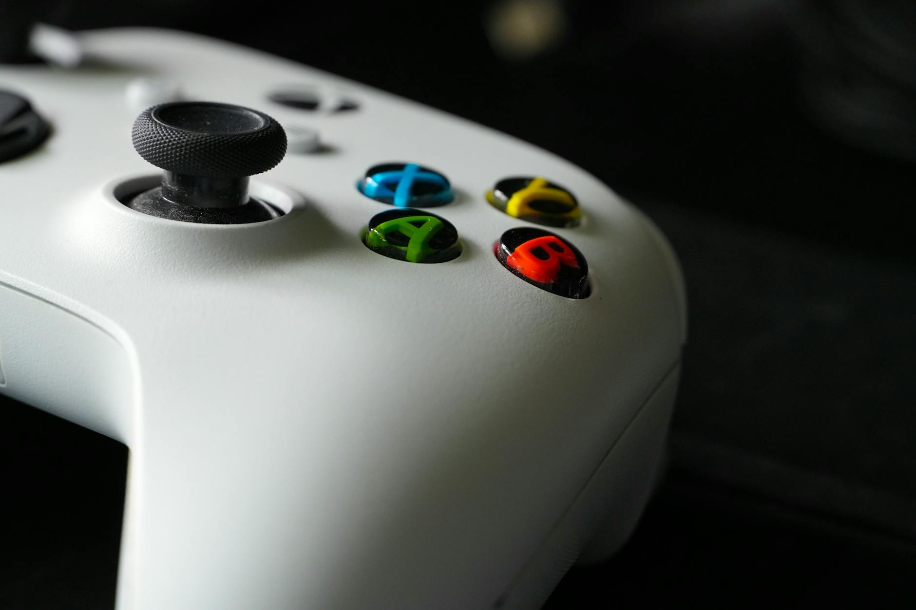 Video game controller on dark background