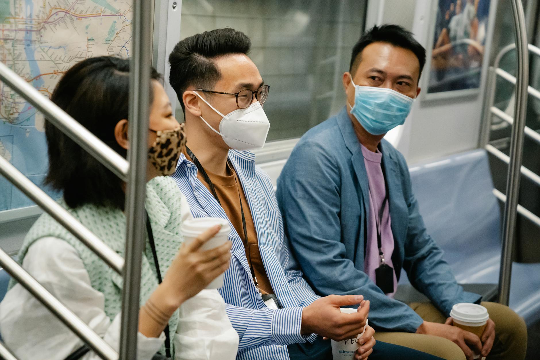 Person wearing LED light therapy mask at home