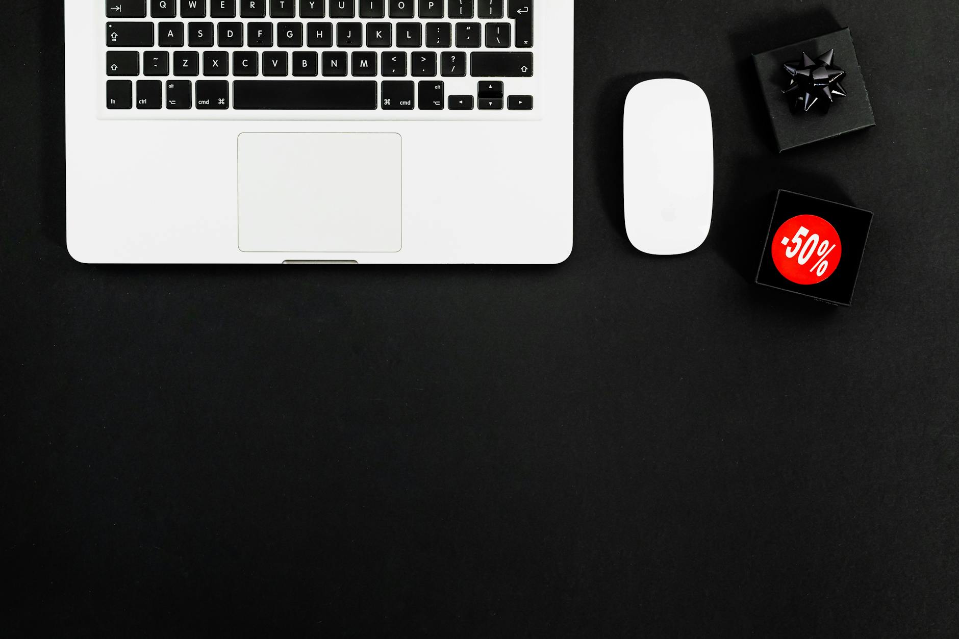 Person browsing furniture deals on laptop screen