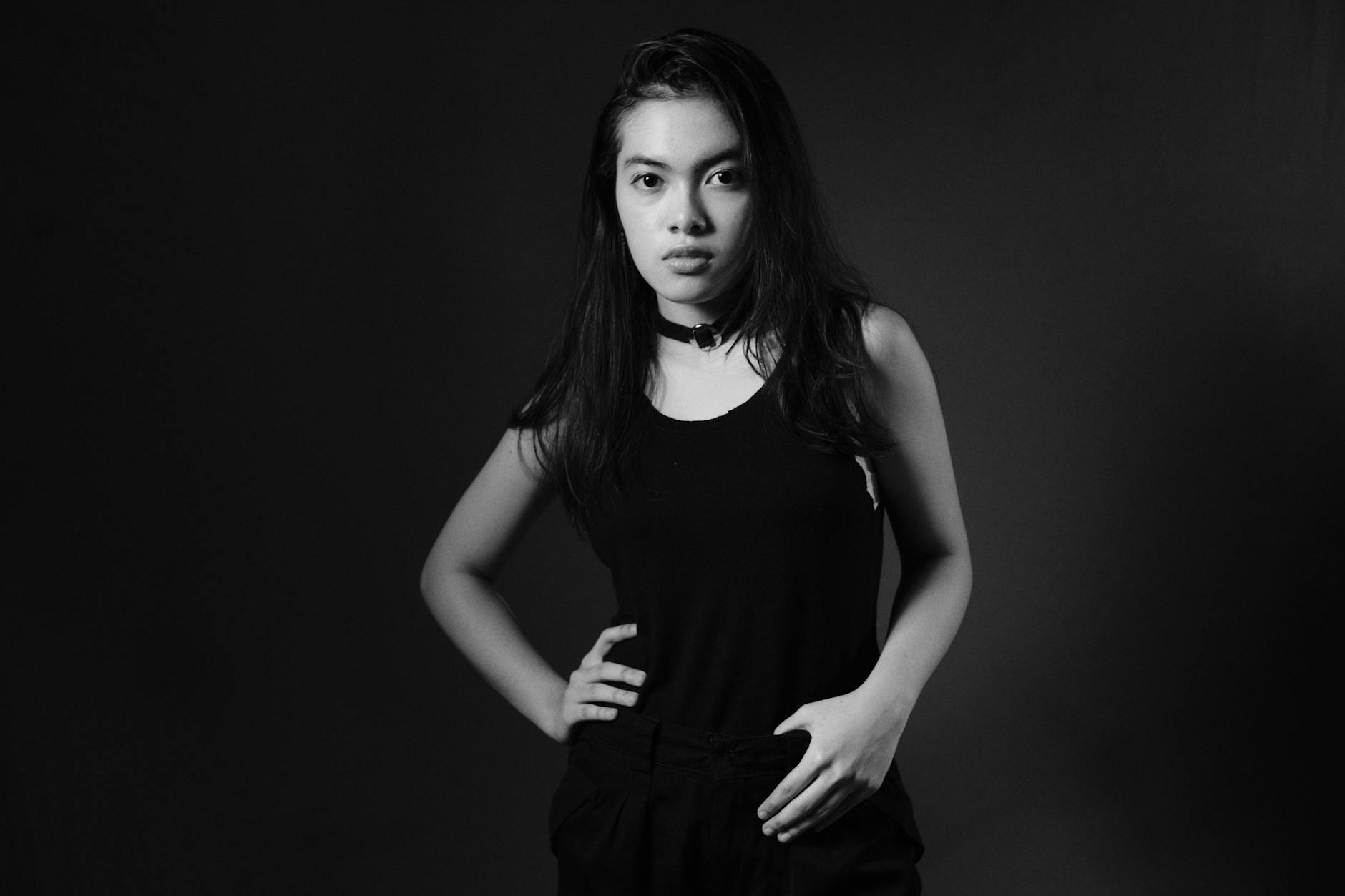 Professional headshot of an actress in dramatic lighting