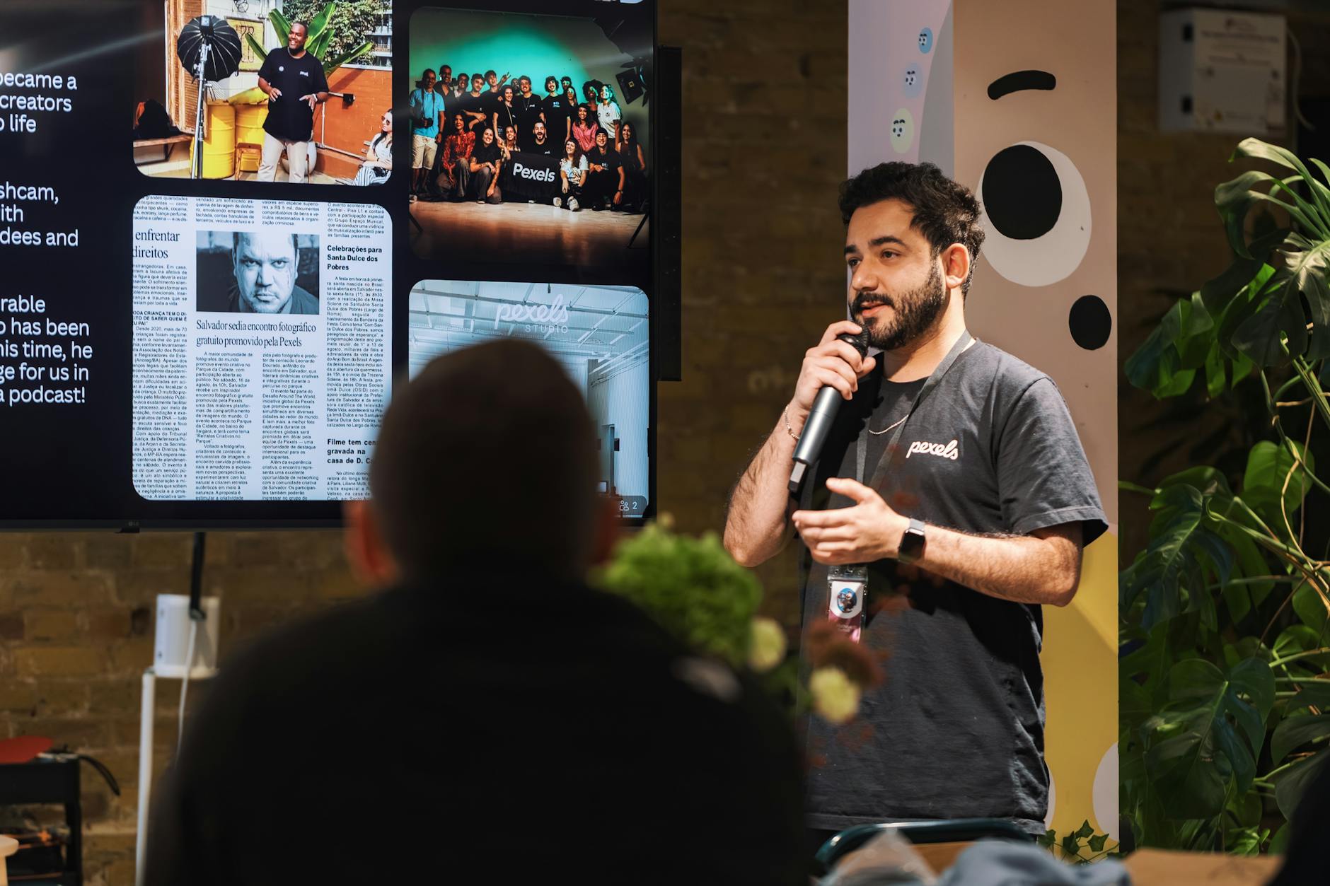 Person speaking at podium during public event