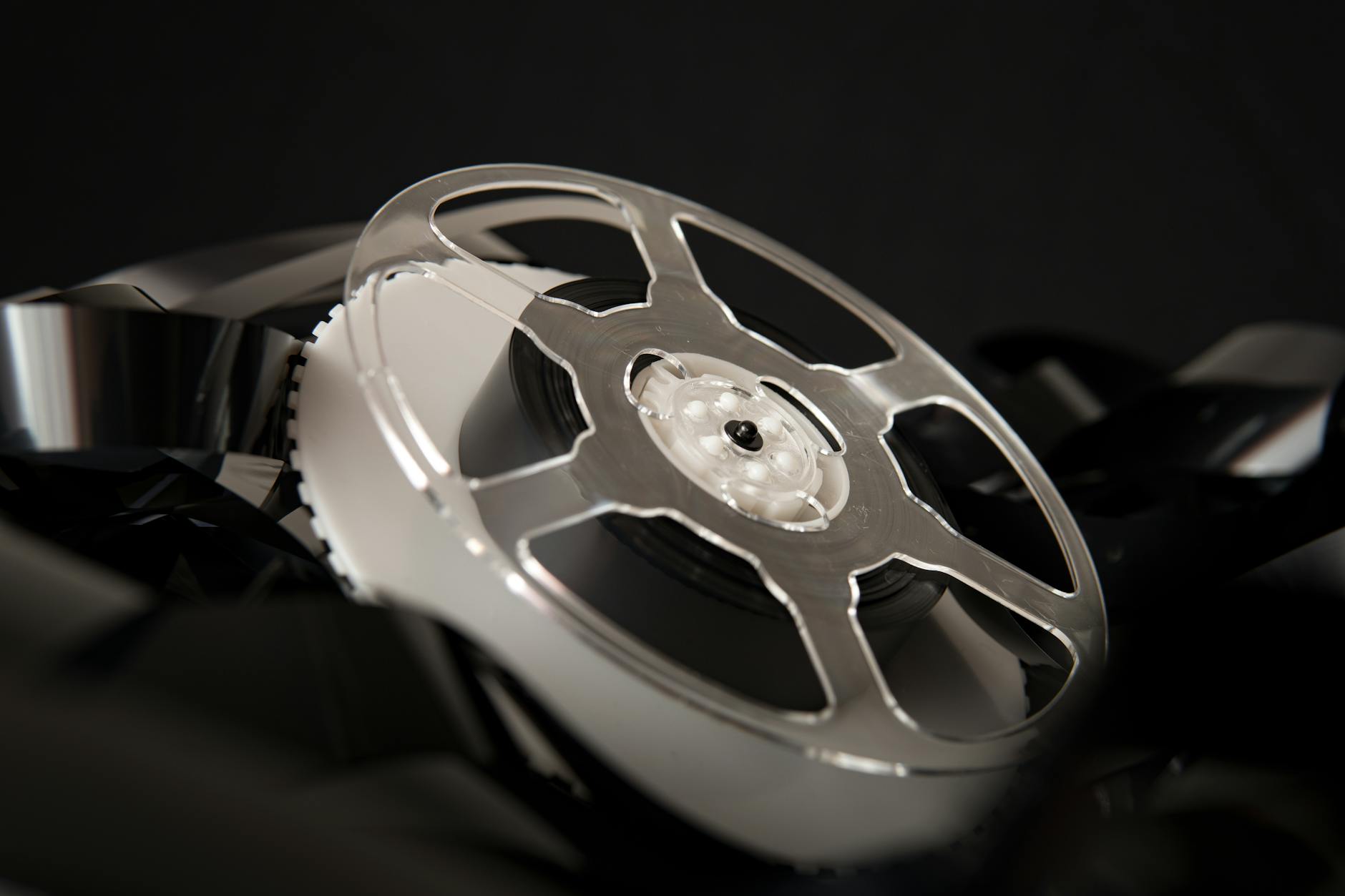 Classic film reel and cinema equipment in dramatic lighting