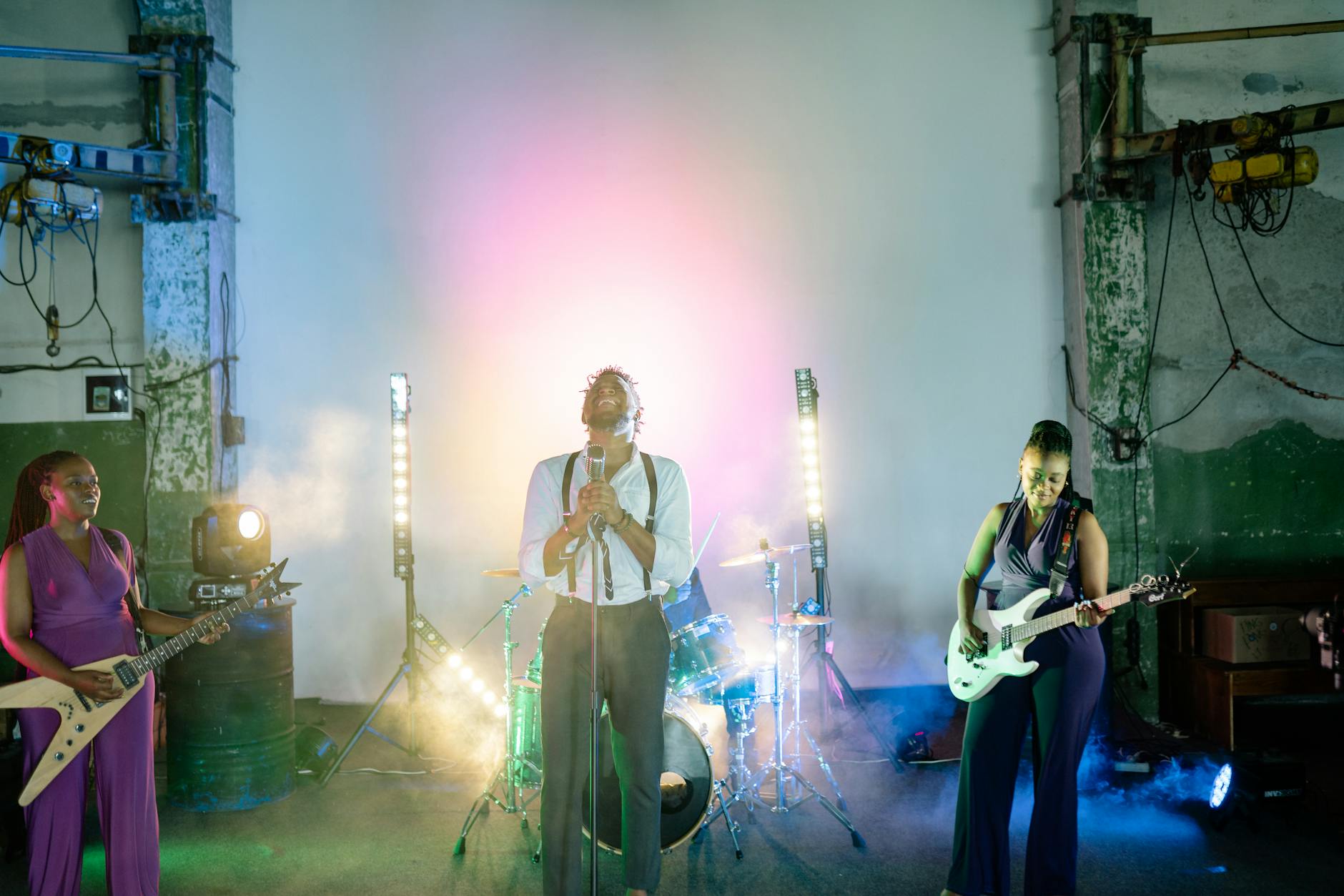 Empty concert stage with dramatic spotlights and theatrical lighting