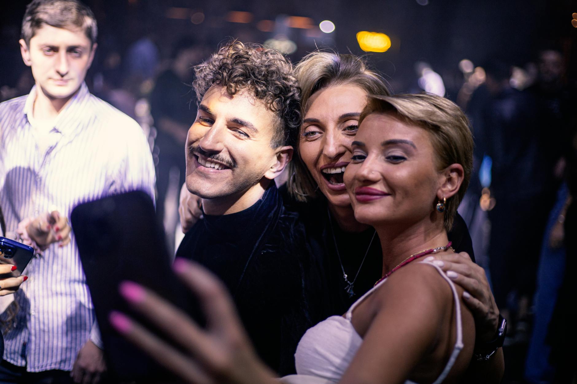 Elegant evening party with fashionable attendees in stylish outfits