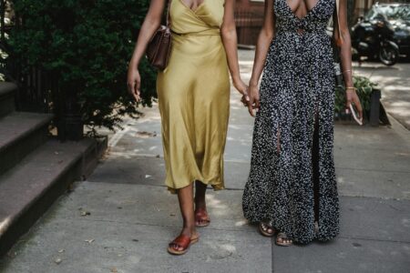Summer Wedding Guests Face New Dress Code Reality Elegant summer dress hanging in natural lighting
