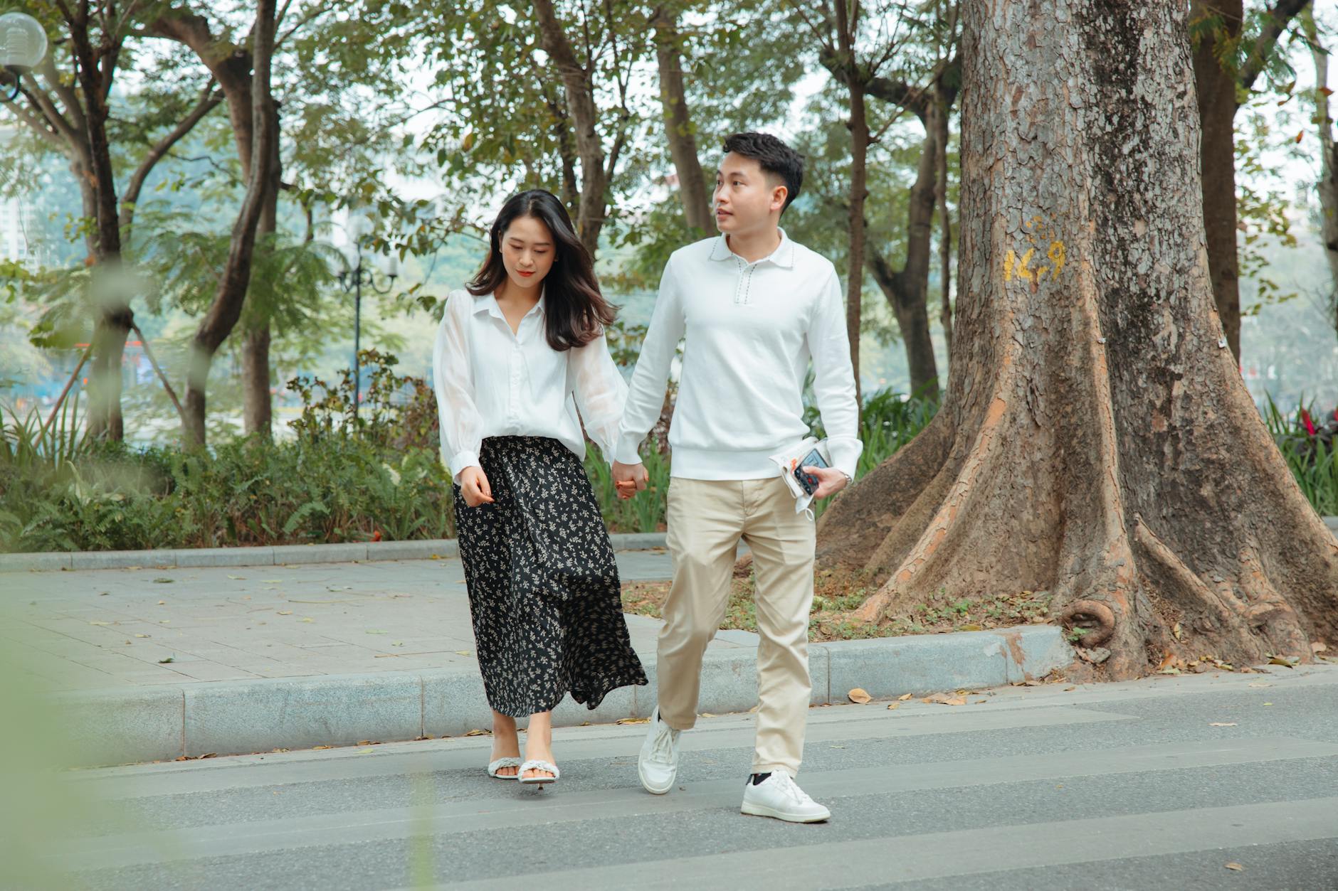 Young couple walking together representing teenage romance and relationships