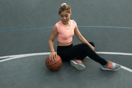 Stylish athletic clothing pieces displayed on hangers