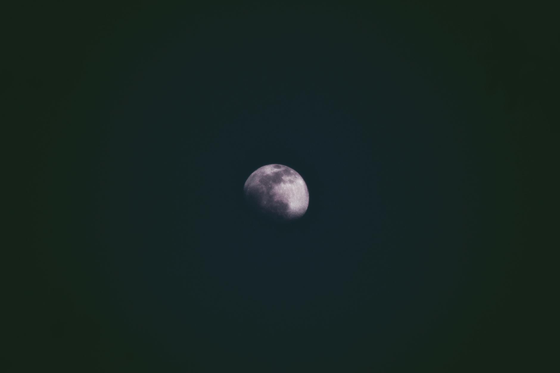 Multiple moon phases arranged in sequence showing lunar cycle progression