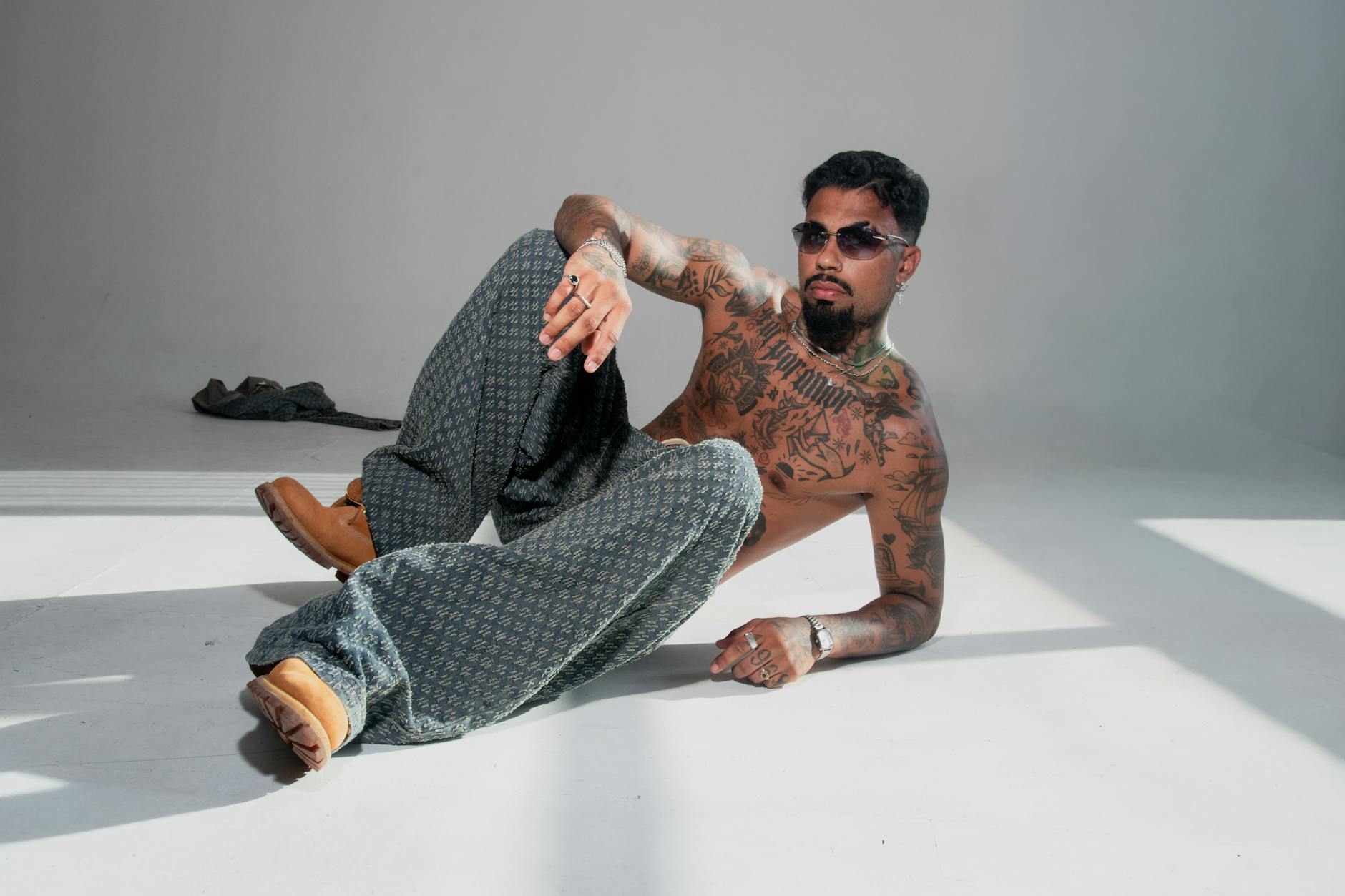 Person wearing loose-fitting athletic pants in casual setting