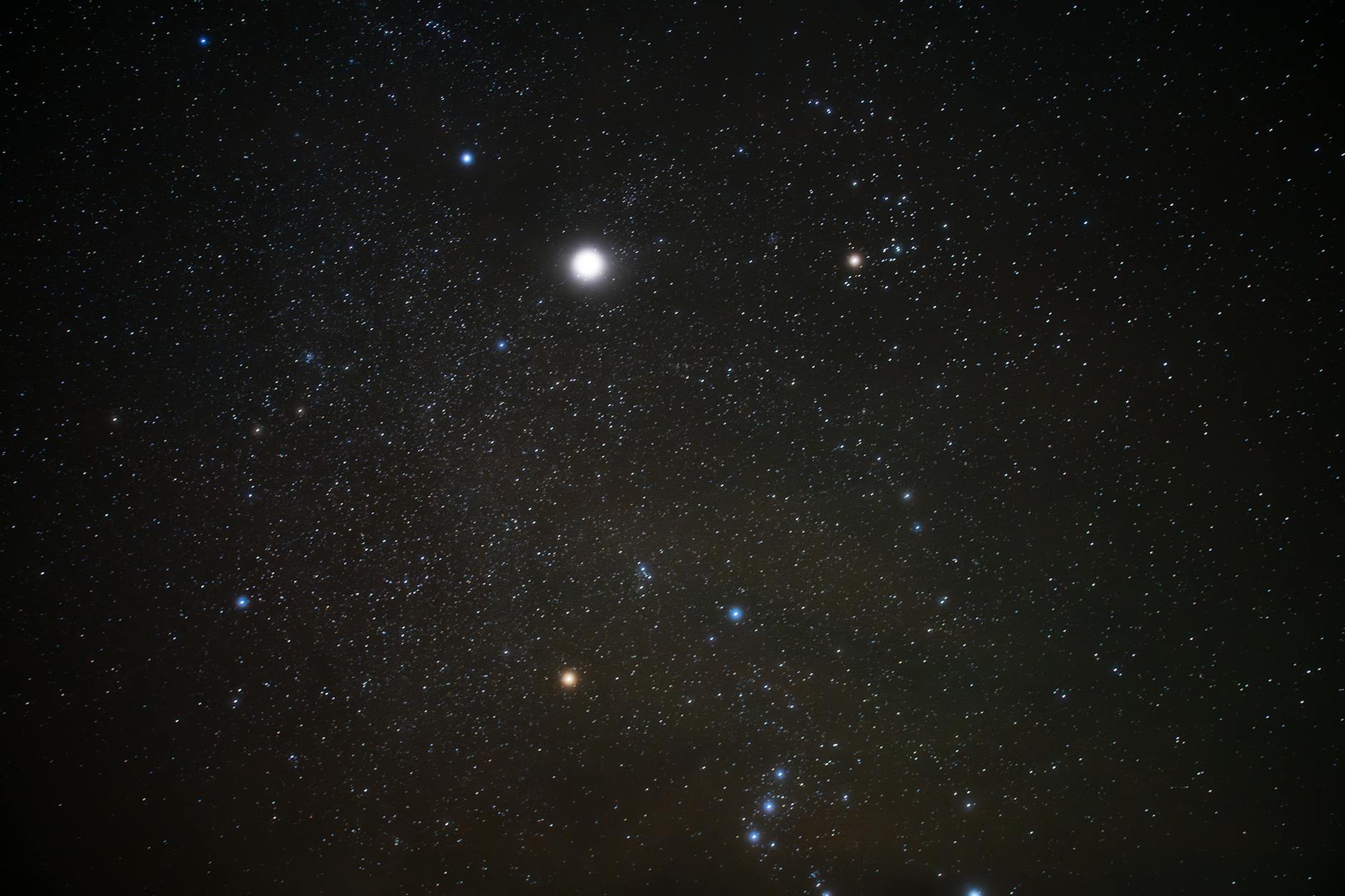 Star constellation pattern against deep space background