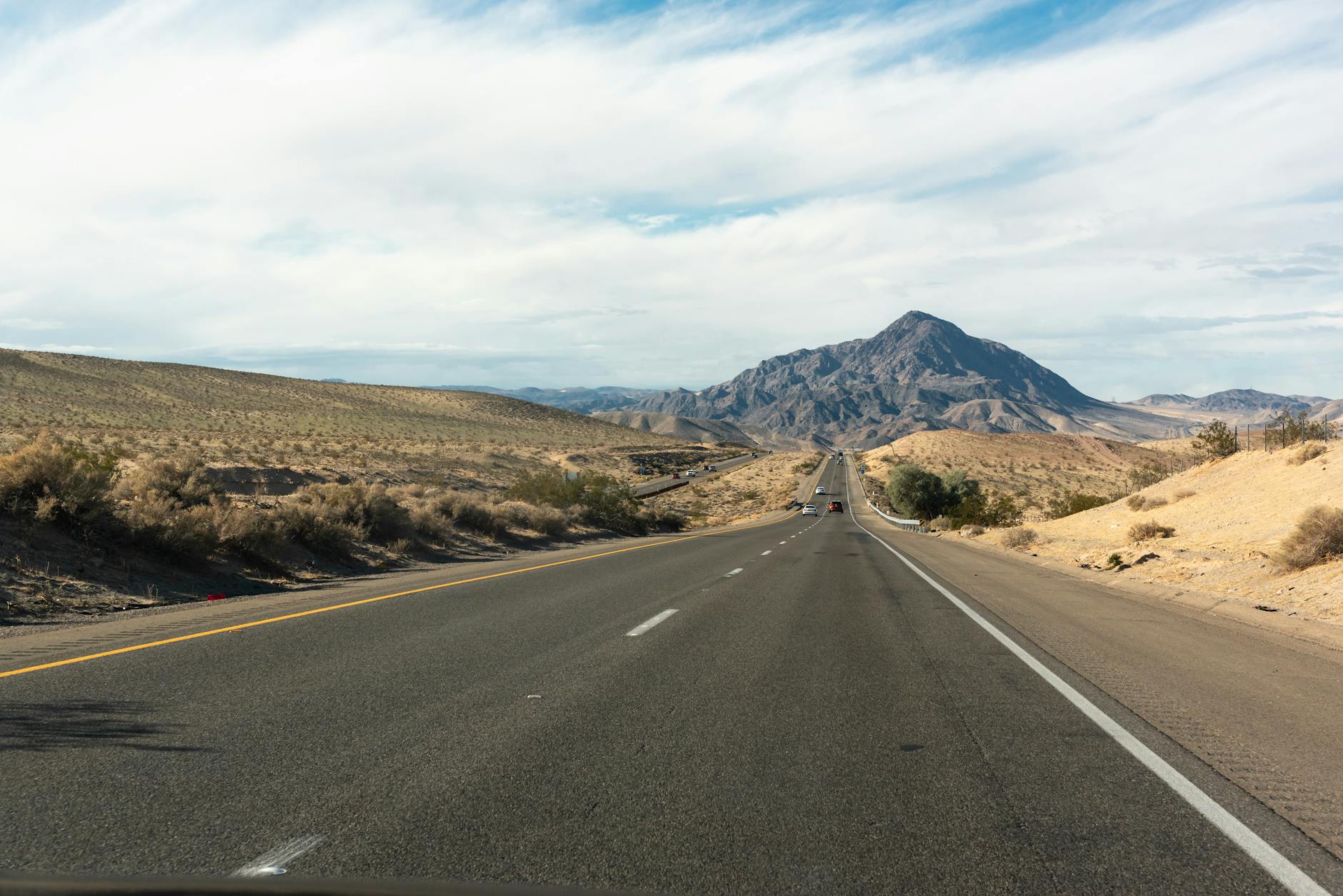 Desert highway representing the sisters' revenge journey