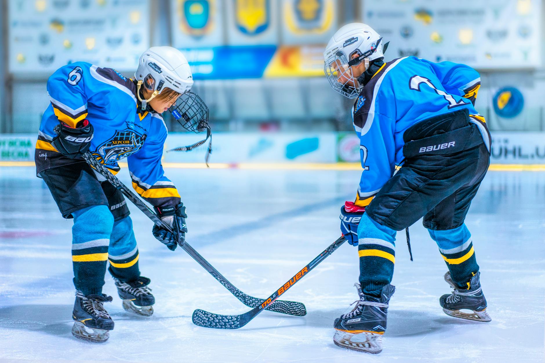 Hockey players on ice rink during game