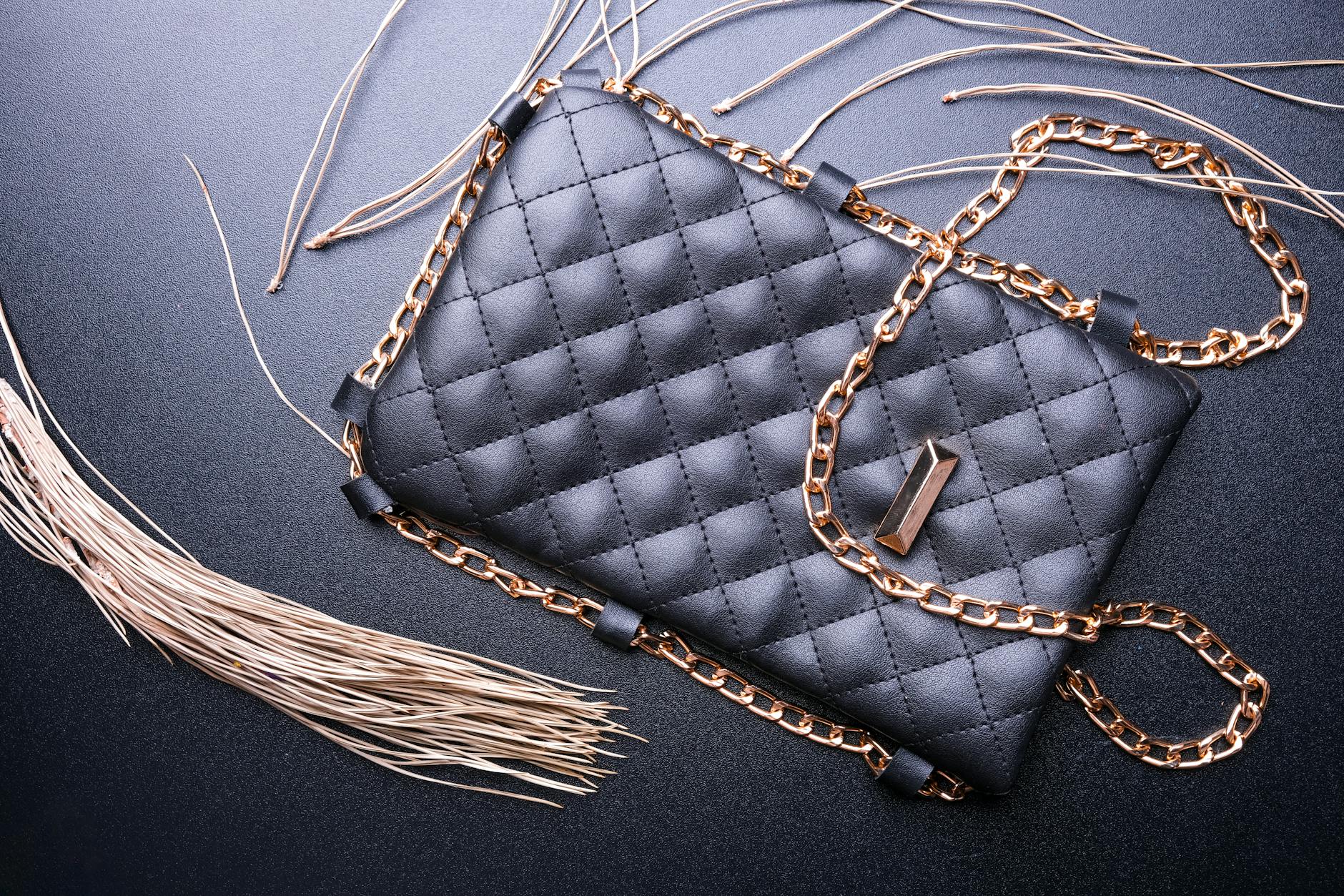 Structured leather shoulder bag on a neutral background