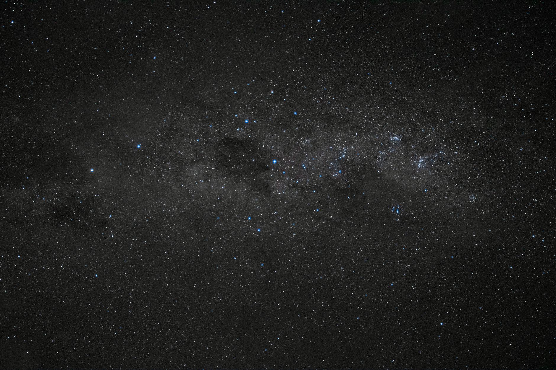 Bright constellation patterns visible against dark night sky