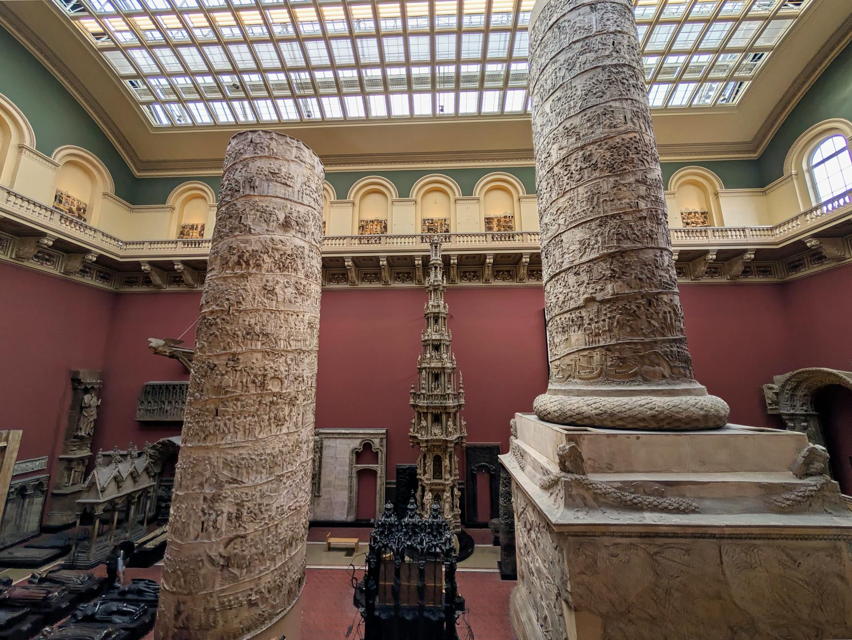 Elegant museum gallery space with art displays and visitors