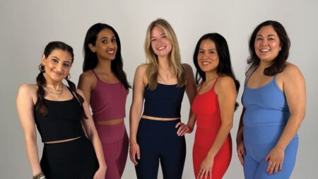 Five Fashion Editors Put Beyond Fashion editors examining athletic wear pieces for quality and fit testing