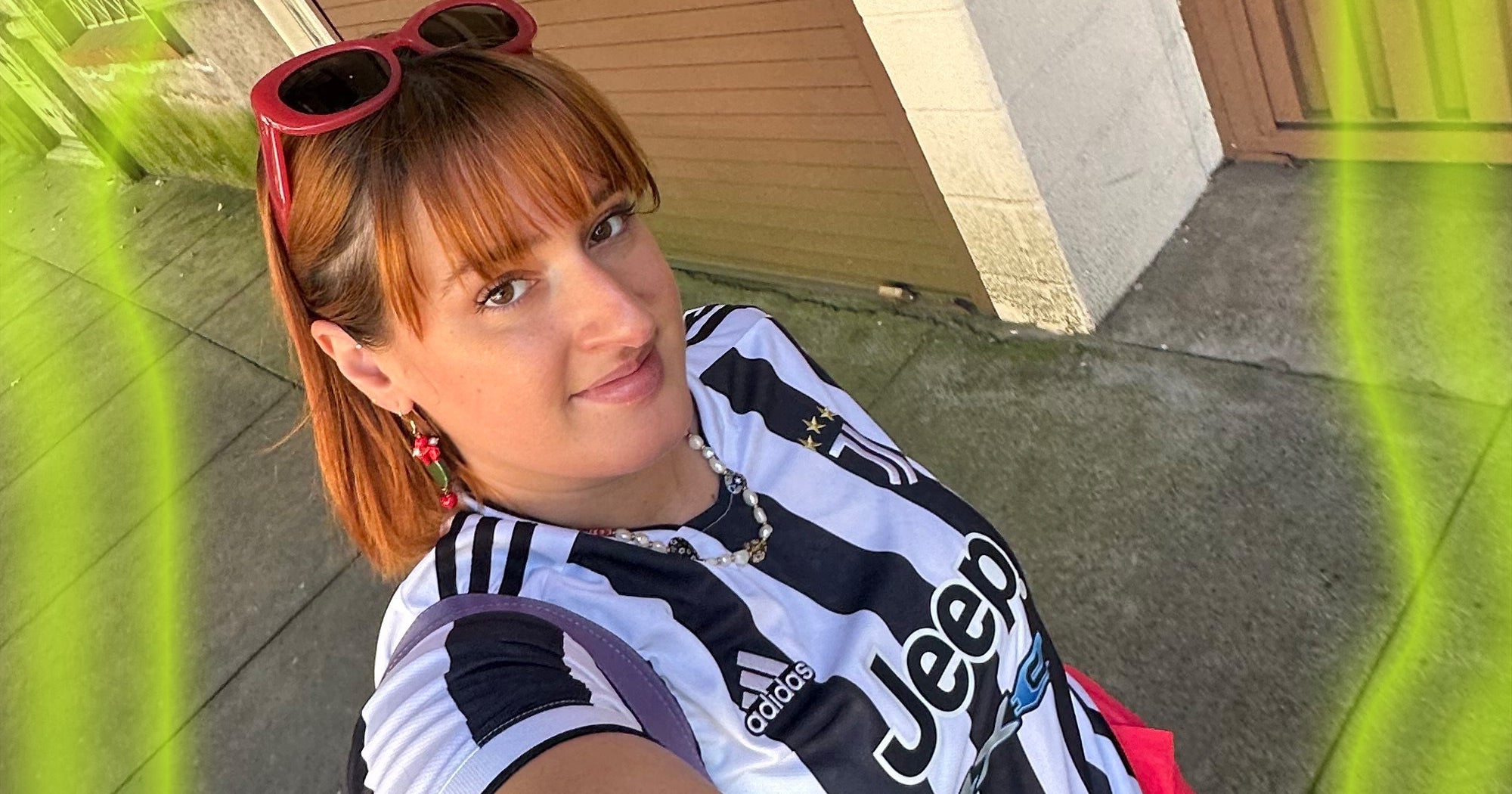 Woman styling soccer jersey for casual everyday wear