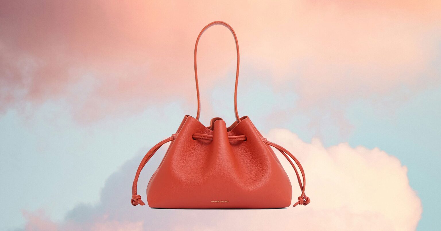 Nordstrom’s Half Yearly Sale Is Here: 29 Fashion & Beauty Finds To Cart Up Woman browsing clothing racks at a department store sale