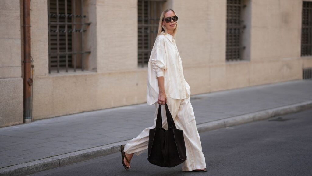 Pajama Pants Break Free From Bedroom Confinement This Summer Person styling comfortable pants with blazer for daytime look