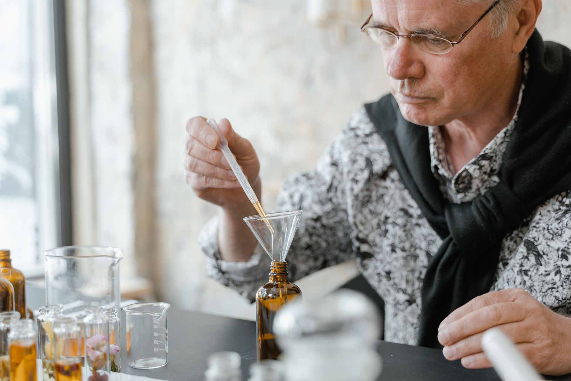 Skincare product development in a clean lab setting with white surfaces