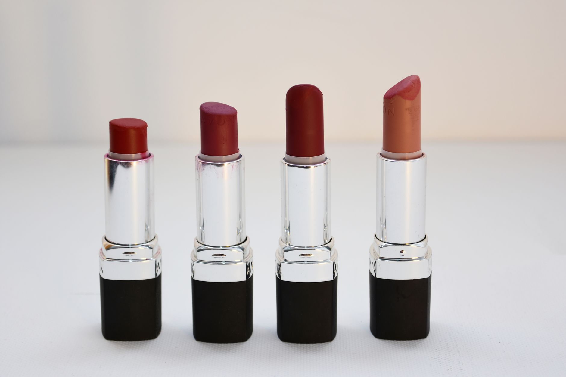 Close-up of a woman wearing a neutral nude lip color