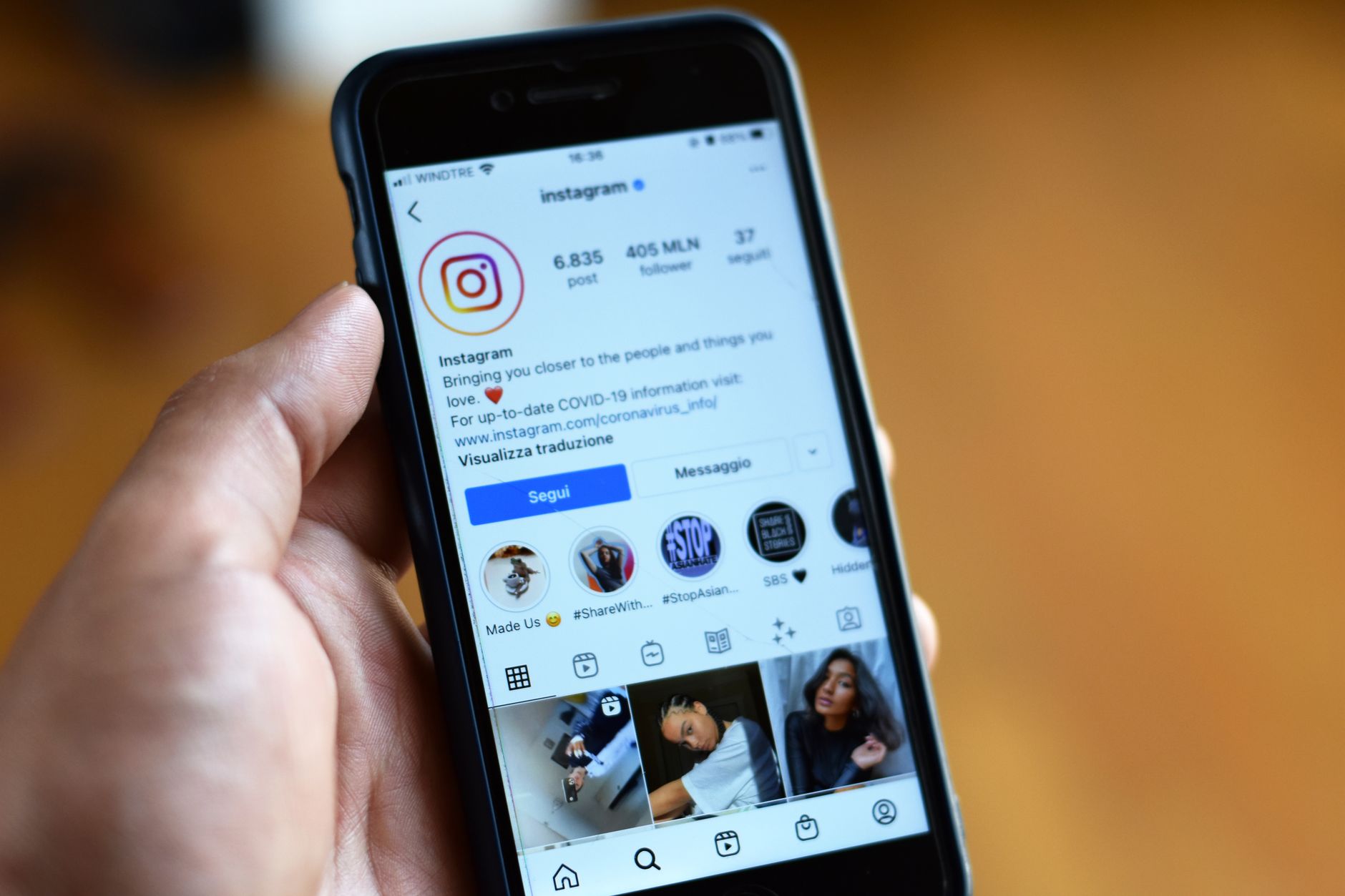 Person setting down a smartphone face-down, symbolizing a deliberate choice to disconnect from social media